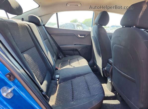 3KPA24AD2PE533198 2023 KIA RIO Blue Вид задніх сидінь
