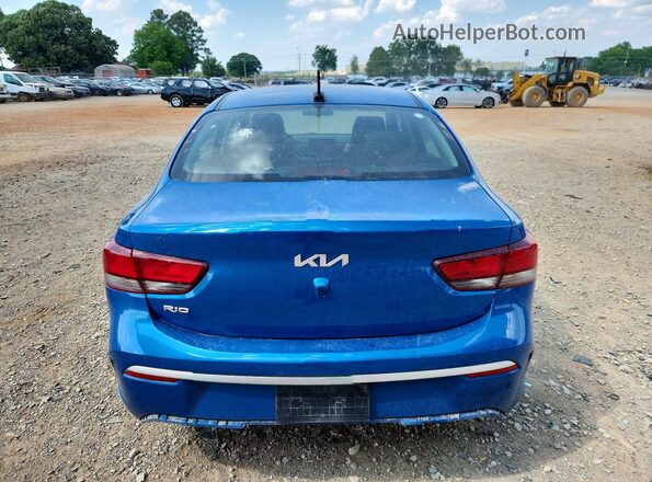 3KPA24AD2PE533198 2023 KIA RIO Blue Вид ззаду