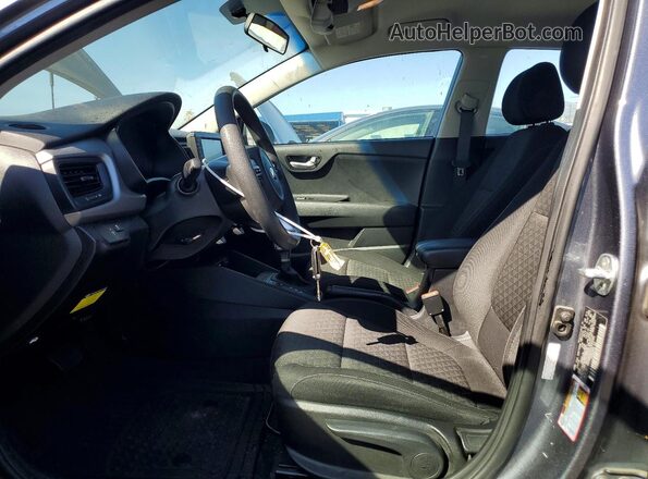 3KPA24AD4LE256094 2020 KIA RIO Charcoal Вид салону спереду