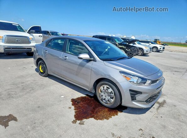 3KPA24AD4PE592544 2023 KIA RIO Серебряный Передняя правая четверть