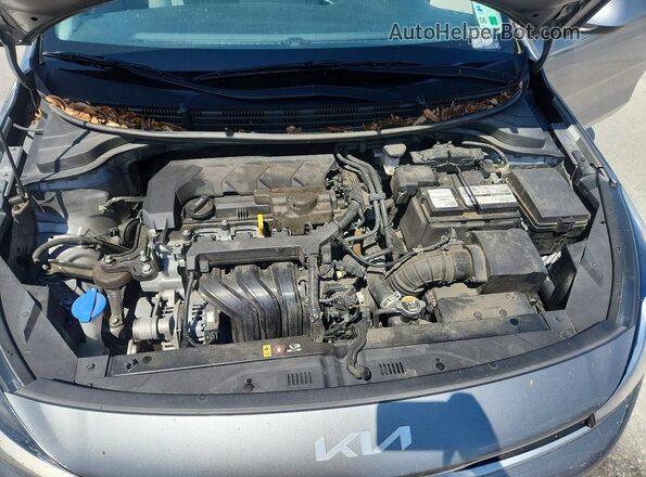 3KPA24AD4PE592544 2023 KIA RIO Серебряный Вид задней части салона