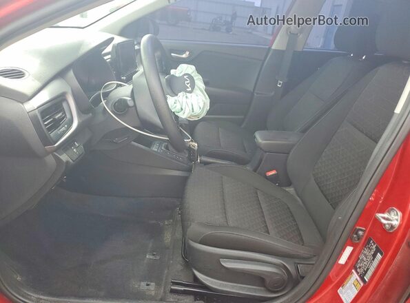 3KPA24AD4PE611433 2023 KIA RIO Red წინა სალონის ხედი