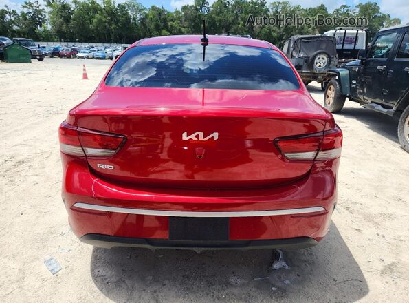 3KPA24AD5PE564834 2023 KIA RIO Red უკანა ხედი