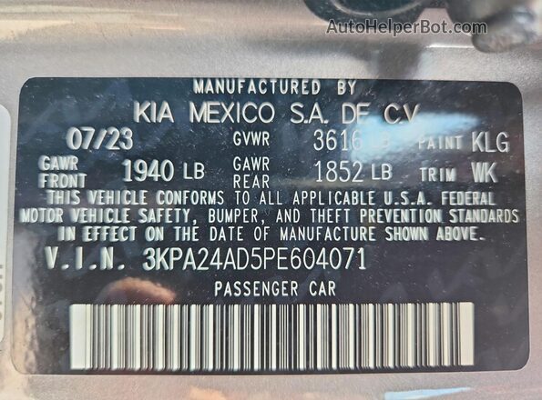 3KPA24AD5PE604071 2023 KIA RIO Gray Widok naklejki z numerem VIN