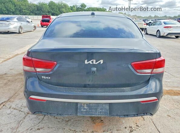 3KPA24AD6PE585305 2023 KIA RIO Black Rear view