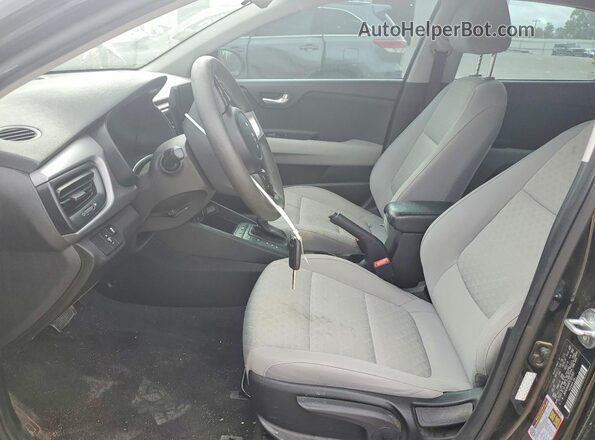 3KPA24AD6PE585305 2023 KIA RIO Black Front interior view