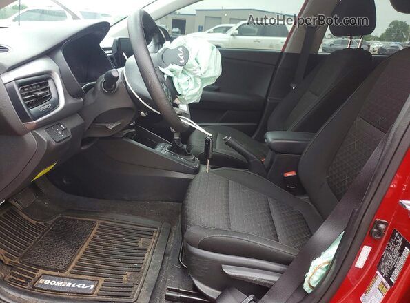 3KPA24AD7PE600359 2023 KIA RIO Red Widok wnętrza z przodu