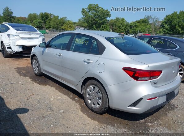 3KPA24AD8PE575455 2023 KIA RIO Silver Trasero izquierdo