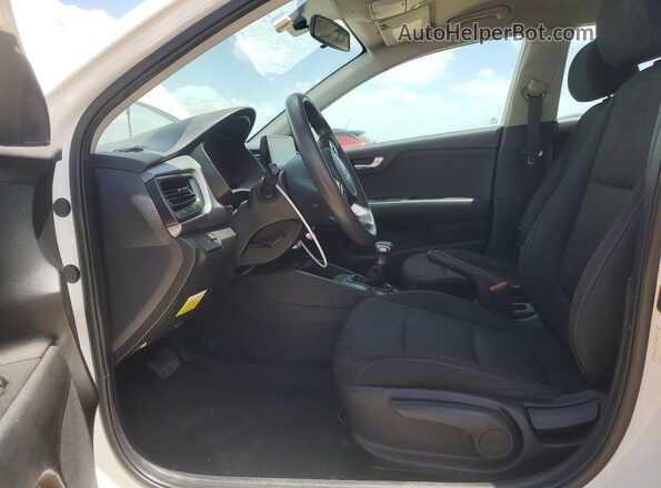3KPA24AD9PE518519 2023 KIA RIO White წინა სალონის ხედი