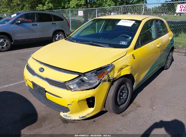 3KPA25AB1JE119986 2018 KIA RIO Yellow Widok z przodu