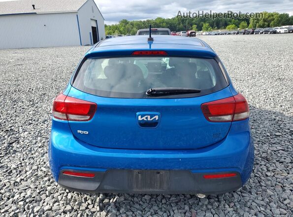 3KPA25AD1PE595844 2023 KIA RIO Синий Вид сзади