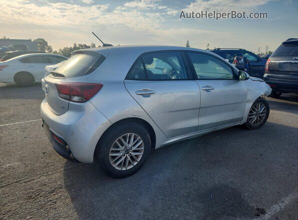 3KPA35AB1JE073301 2018 KIA RIO Silver Trasero derecho