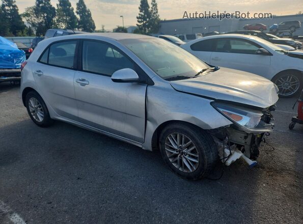 3KPA35AB1JE073301 2018 KIA RIO Silver Delantero derecho