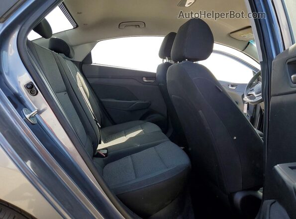3KPC24A32JE037101 2018 HYUNDAI ACCENT Gray Vista de los asientos traseros