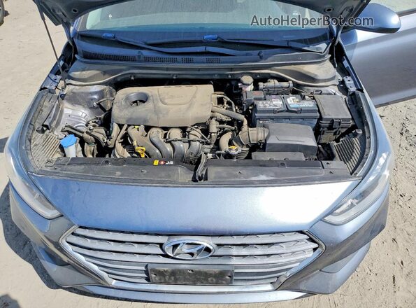 3KPC24A32JE037101 2018 HYUNDAI ACCENT Gray Vista interior trasera