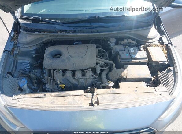 3KPC34A3XKE068627 2019 HYUNDAI ACCENT Серый Вид сзади