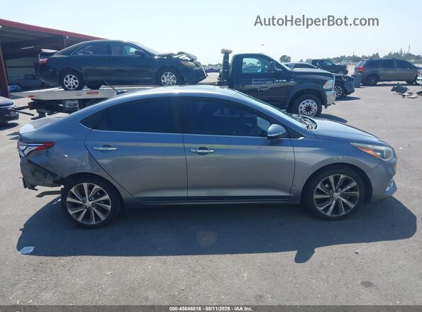3KPC34A3XKE068627 2019 HYUNDAI ACCENT Серый Вид задней части салона