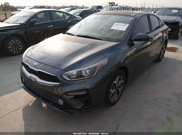 3KPF24AD0KE009353 2019 KIA FORTE Gray Vista tres cuartos delantera izquierda