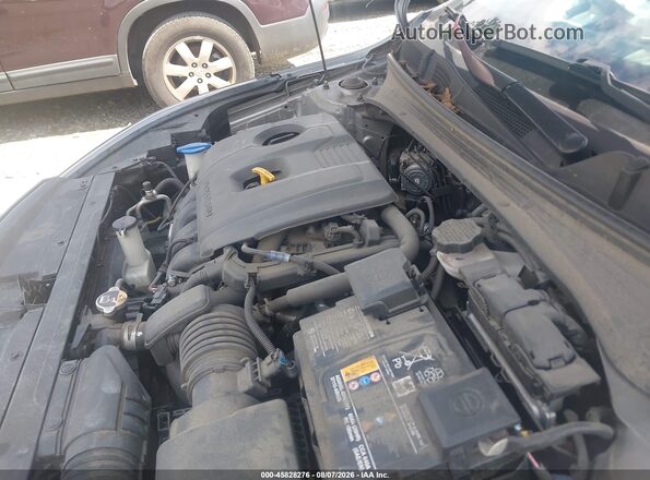 3KPF24AD0RE738589 2024 KIA FORTE Silver Rear view
