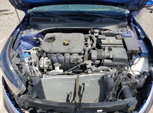 3KPF24AD0RE823982 2024 KIA FORTE Синий Вид задней части салона