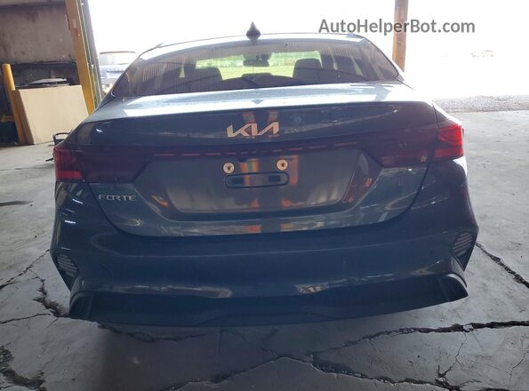 3KPF24AD1PE585587 2023 KIA FORTE Серый Вид сзади