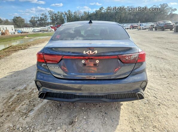 3KPF24AD1PE681963 2023 KIA FORTE Gray Вид ззаду