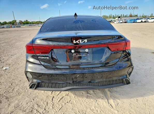 3KPF24AD1RE714768 2024 KIA FORTE Black Rear view