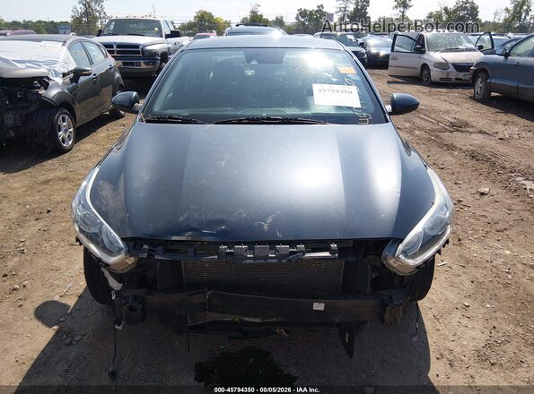 3KPF24AD2KE125802 2019 KIA FORTE Gray უკანა სალონის ხედი