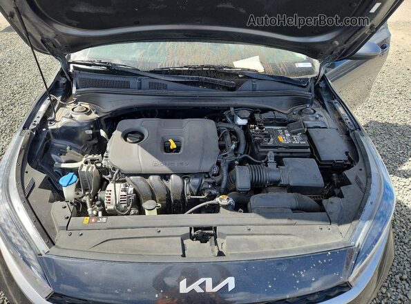 3KPF24AD2PE596811 2023 KIA FORTE Угольный Вид задней части салона