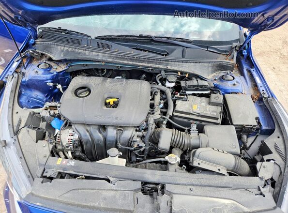 3KPF24AD2RE736813 2024 KIA FORTE Blue Вид задньої частини салону