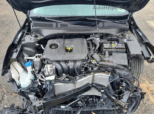3KPF24AD2RE783565 2024 KIA FORTE Black Vista interior trasera