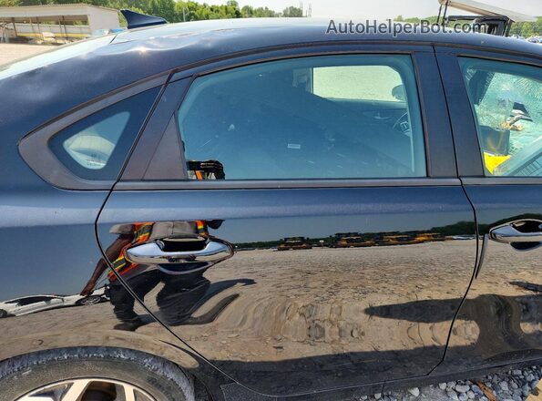 3KPF24AD3ME339331 2021 KIA FORTE Black Vista de los asientos traseros