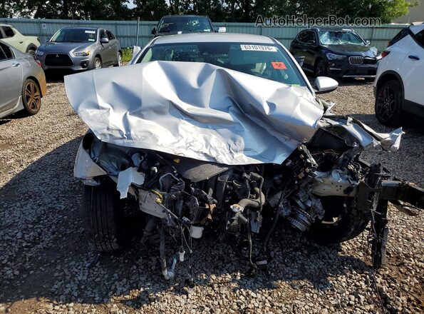 3KPF24AD3ME345808 2021 KIA FORTE Серебряный Вид спереди