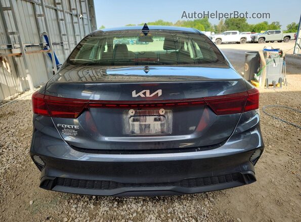 3KPF24AD3RE705389 2024 KIA FORTE Gray Rear view