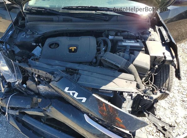 3KPF24AD4RE712979 2024 KIA FORTE Black Vista interior trasera