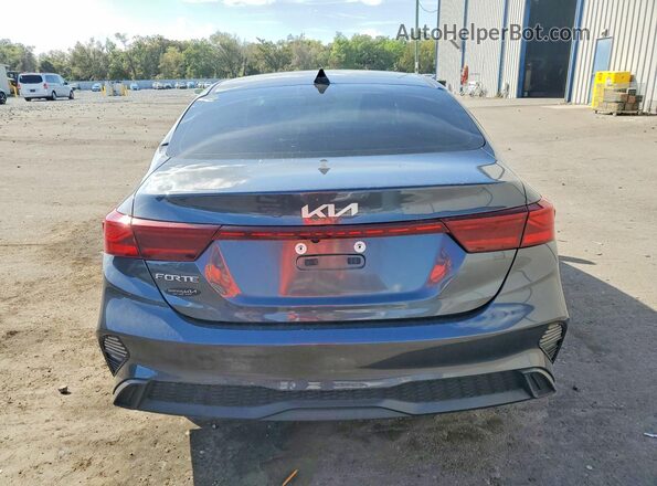3KPF24AD4RE713856 2024 KIA FORTE Gray Rear view