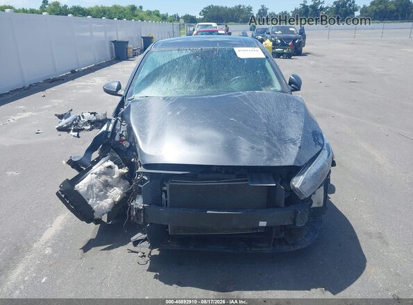 3KPF24AD4RE739485 2024 KIA FORTE Серый Вид задней части салона