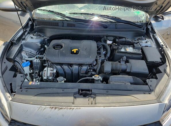 3KPF24AD4RE764984 2024 KIA FORTE Серебряный Вид задней части салона