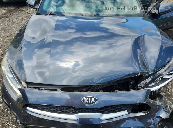 3KPF24AD6KE097597 2019 KIA FORTE Gray Вид задньої частини салону
