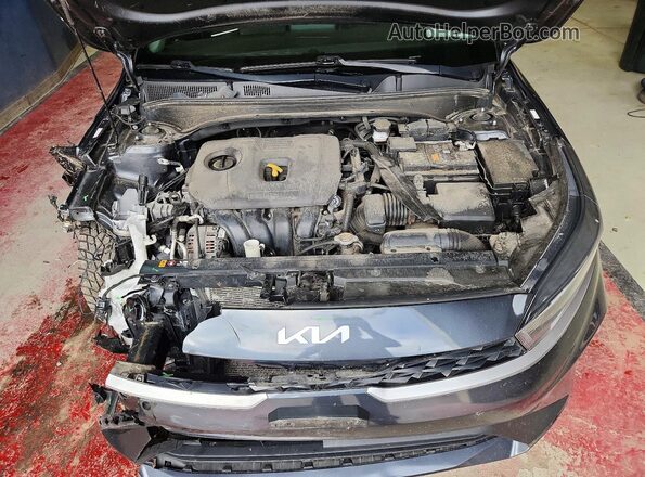 3KPF24AD6PE533355 2023 KIA FORTE Charcoal Vista interior trasera