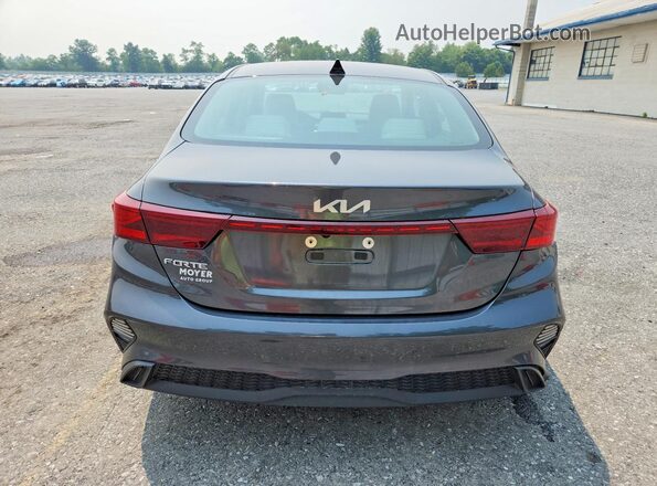 3KPF24AD6PE661885 2023 KIA FORTE Серый Вид сзади