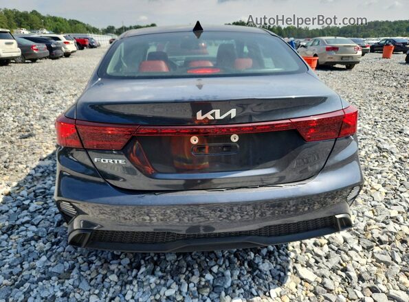 3KPF24AD6RE831651 2024 KIA FORTE Gray Rear view