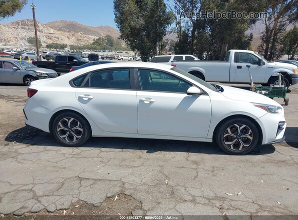 3KPF24AD7KE010841 2019 KIA FORTE White Вид задньої частини салону