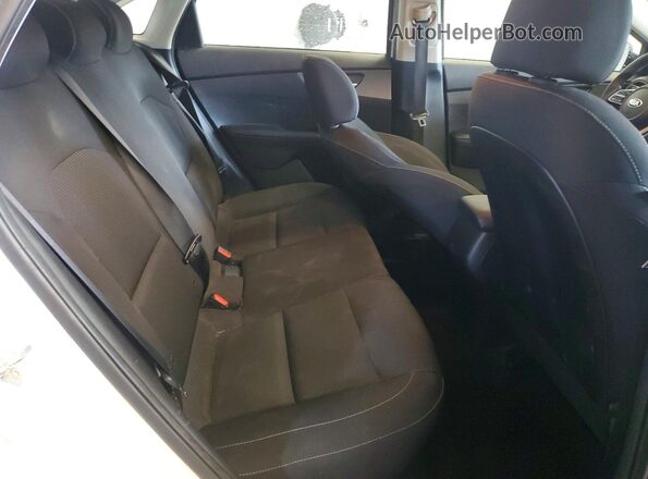 3KPF24AD7KE011892 2019 KIA FORTE White უკანა სავარძლების ხედი