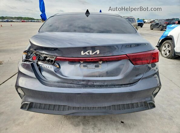 3KPF24AD7PE572861 2023 KIA FORTE Gray Rear view