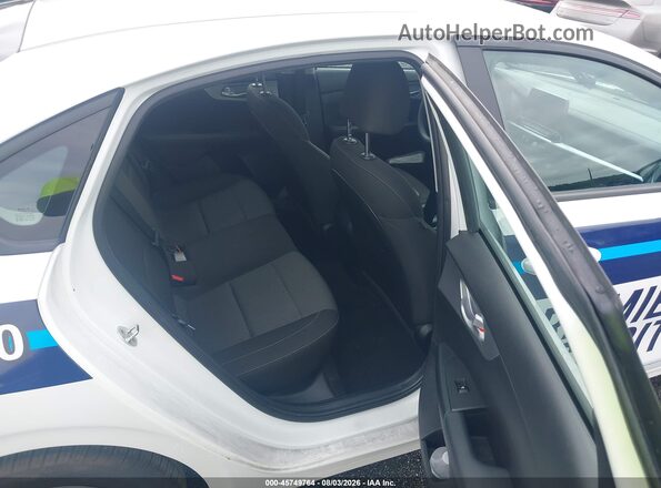 3KPF24AD7PE594844 2023 KIA FORTE White Вид наклейки з VIN-кодом