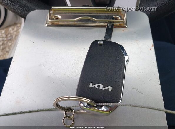 3KPF24AD8PE507811 2023 KIA FORTE Белый Вид панели приборов