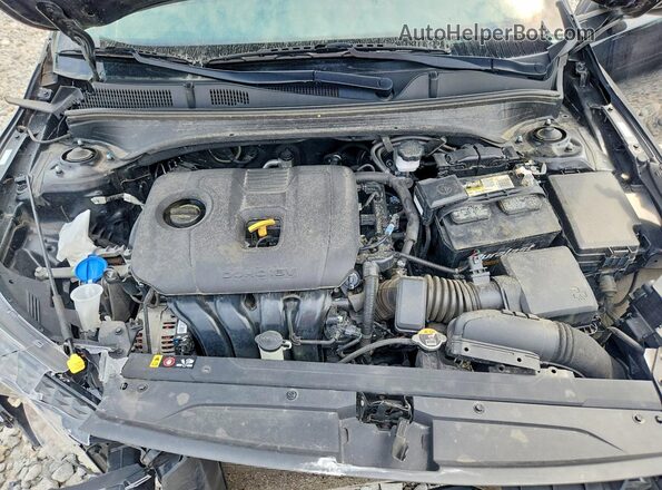 3KPF24AD8RE781304 2024 KIA FORTE Черный Вид задней части салона