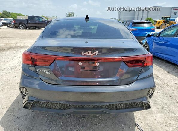 3KPF24ADXRE783944 2024 KIA FORTE Серый Вид сзади