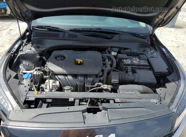 3KPF24ADXRE783944 2024 KIA FORTE Серый Вид задней части салона